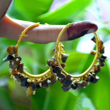 Janaksh Handcrafted brass and gold plated hoop earrings with semiprecious uncut gemstone Loreals