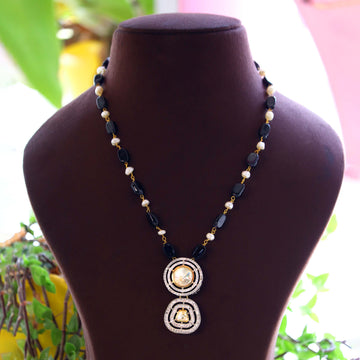Janaksh statment neckalce : fusion piece of polki kundan and freshwater pearls with semiprecious stones