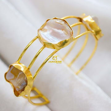 Elevate your style with this exquisite golden polish bracelet, a perfect blend of elegance and sophistication