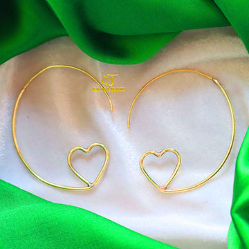 Heart-shaped, gold-plated hoop earrings