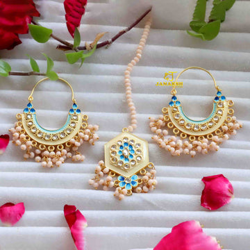 Janaksh mangtika and Chandbali gold plated brass earrings with heavy loreal work