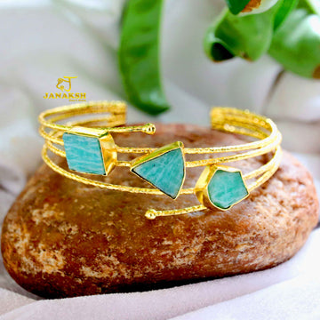 Brass-based bracelet, featuring raw, vibrant stones