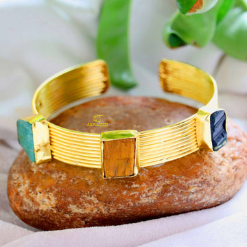 Embrace elegance with our brass-based raw stone bangles and bracelets, finished with a golden polish – a timeless favorite for girls and women alike