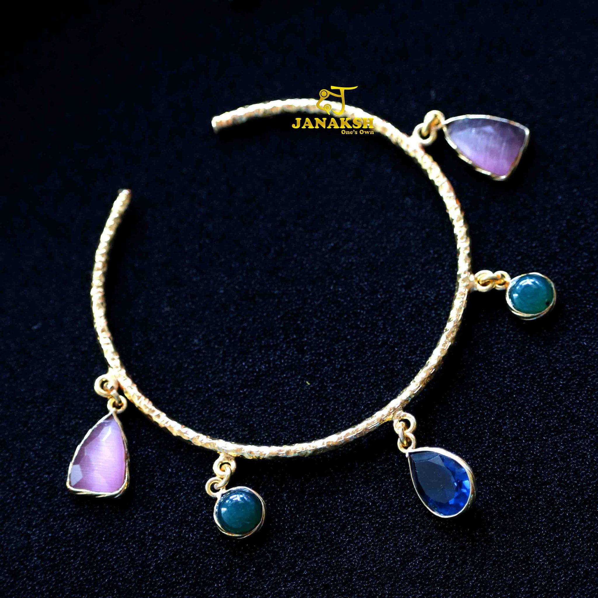 Stones bracelet with golden polish