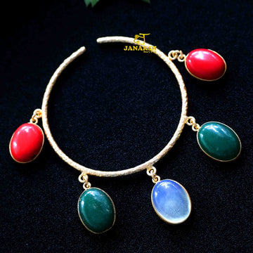 Stones bracelet with golden polish