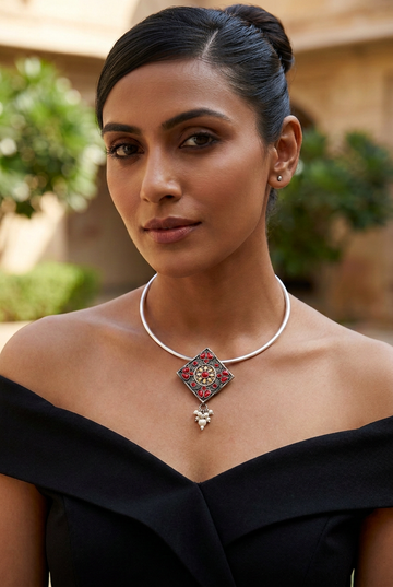 Revised model photo with a sleek updo and closer-fitting hasuli necklace